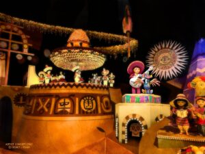 Miguel e Dante de Coco chegam à atração “it’s a small world” na Disneyland